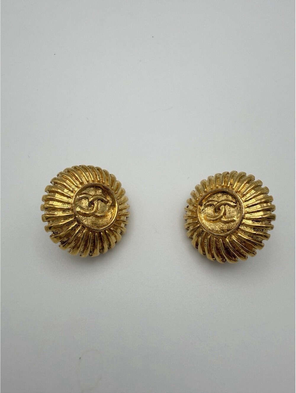 Authentic Chanel Vintage CC Sunburst Medallion Clip On Earrings Gold Plated 1993